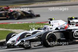 Kevin Magnussen (DEN), McLaren F1 and Valtteri Bottas (FIN), Williams F1 Team  30.03.2014. Formula 1 World Championship, Rd 2, Malaysian Grand Prix, Sepang, Malaysia, Sunday.