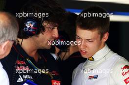 Daniil Kvyat (RUS) Scuderia Toro Rosso with Marcos Matassa (ITA) Scuderia Toro Rosso Race Engineer. 29.03.2014. Formula 1 World Championship, Rd 2, Malaysian Grand Prix, Sepang, Malaysia, Saturday.