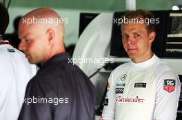 (L to R): Jan Magnussen (DEN) with his son Kevin Magnussen (DEN) McLaren. 29.03.2014. Formula 1 World Championship, Rd 2, Malaysian Grand Prix, Sepang, Malaysia, Saturday.