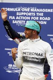 Lewis Hamilton (GBR) Mercedes AMG F1 celebrates his pole position in parc ferme. 29.03.2014. Formula 1 World Championship, Rd 2, Malaysian Grand Prix, Sepang, Malaysia, Saturday.