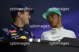 (L to R): Sebastian Vettel (GER) Red Bull Racing with pole sitter Lewis Hamilton (GBR) Mercedes AMG F1 in the post qualifying FIA Press Conference. 29.03.2014. Formula 1 World Championship, Rd 2, Malaysian Grand Prix, Sepang, Malaysia, Saturday.