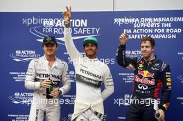 Qualifying top three in parc ferme (L to R): Nico Rosberg (GER) Mercedes AMG F1, third; Lewis Hamilton (GBR) Mercedes AMG F1, pole position; Sebastian Vettel (GER) Red Bull Racing, second. 29.03.2014. Formula 1 World Championship, Rd 2, Malaysian Grand Prix, Sepang, Malaysia, Saturday.