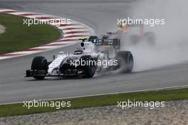 Valtteri Bottas (FIN), Williams F1 Team and Daniel Ricciardo (AUS), Red Bull Racing  29.03.2014. Formula 1 World Championship, Rd 2, Malaysian Grand Prix, Sepang, Malaysia, Saturday.