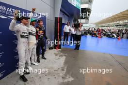 Nico Rosberg (GER), Mercedes AMG F1 Team, Lewis Hamilton (GBR), Mercedes AMG F1 Team and Sebastian Vettel (GER), Red Bull Racing  29.03.2014. Formula 1 World Championship, Rd 2, Malaysian Grand Prix, Sepang, Malaysia, Saturday.