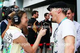 (L to R): Jennie Gow (GBR) BBC Radio 5 Live Pitlane Reporter with Benedict Cumberbatch (GBR) Actor. 29.03.2014. Formula 1 World Championship, Rd 2, Malaysian Grand Prix, Sepang, Malaysia, Saturday.