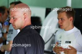 (L to R): Jan Magnussen (DEN) with his son Kevin Magnussen (DEN) McLaren. 29.03.2014. Formula 1 World Championship, Rd 2, Malaysian Grand Prix, Sepang, Malaysia, Saturday.