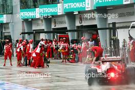 Fernando Alonso (ESP) Ferrari F14-T makes a pit stop. 29.03.2014. Formula 1 World Championship, Rd 2, Malaysian Grand Prix, Sepang, Malaysia, Saturday.