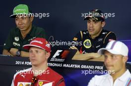 (L to R): Kamui Kobayashi (JPN) Caterham and Pastor Maldonado (VEN) Lotus F1 Team in the FIA Press Conference. 27.03.2014. Formula 1 World Championship, Rd 2, Malaysian Grand Prix, Sepang, Malaysia, Thursday.