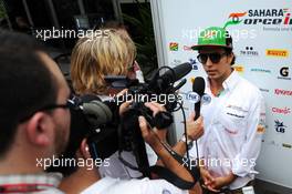 Sergio Perez (MEX) Sahara Force India F1 with the media. 27.03.2014. Formula 1 World Championship, Rd 2, Malaysian Grand Prix, Sepang, Malaysia, Thursday.