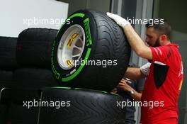 Ferrari mechanic prepares intermediate Pirelli tyres. 27.03.2014. Formula 1 World Championship, Rd 2, Malaysian Grand Prix, Sepang, Malaysia, Thursday.