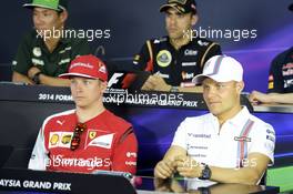 (L to R): Kimi Raikkonen (FIN) Ferrari and Valtteri Bottas (FIN) Williams in the FIA Press Conference. 27.03.2014. Formula 1 World Championship, Rd 2, Malaysian Grand Prix, Sepang, Malaysia, Thursday.