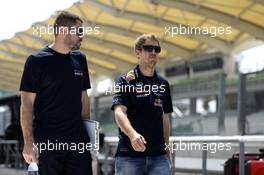 Sebastian Vettel (GER) Red Bull Racing (Right) walks the circuit with Guillaume Rocquelin (ITA) Red Bull Racing Race Engineer. 27.03.2014. Formula 1 World Championship, Rd 2, Malaysian Grand Prix, Sepang, Malaysia, Thursday.