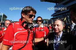 Graeme Lowdon (GBR) Marussia F1 Team Chief Executive Officer and Jean Todt (FRA) FIA President 12.10.2014. Formula 1 World Championship, Rd 16, Russian Grand Prix, Sochi Autodrom, Sochi, Russia, Race Day.