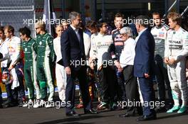 The drivers, Bernie Ecclestone (GBR) and dignitaries observe a tribute to Jules Bianchi  and the Russian national anthem. 12.10.2014. Formula 1 World Championship, Rd 16, Russian Grand Prix, Sochi Autodrom, Sochi, Russia, Race Day.