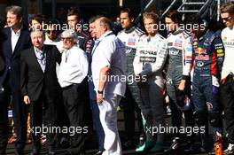 The drivers, Jean Todt (FRA) FIA President, Bernie Ecclestone (GBR) and dignitaries observe a tribute to Jules Bianchi  and the Russian national anthem. 12.10.2014. Formula 1 World Championship, Rd 16, Russian Grand Prix, Sochi Autodrom, Sochi, Russia, Race Day.