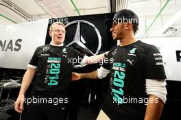 Lewis Hamilton (GBR) Mercedes AMG F1 celebrates winning the 2014 Constructors' Championship with the team. 12.10.2014. Formula 1 World Championship, Rd 16, Russian Grand Prix, Sochi Autodrom, Sochi, Russia, Race Day.