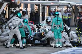 Lewis Hamilton (GBR) Mercedes AMG F1 pit stop. 12.10.2014. Formula 1 World Championship, Rd 16, Russian Grand Prix, Sochi Autodrom, Sochi, Russia, Race Day.