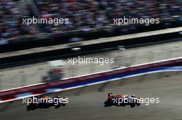 Sebastian Vettel (GER) Red Bull Racing RB10 leads Daniel Ricciardo (AUS) Red Bull Racing RB10. 12.10.2014. Formula 1 World Championship, Rd 16, Russian Grand Prix, Sochi Autodrom, Sochi, Russia, Race Day.