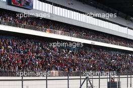 Fans in the grandstand. 12.10.2014. Formula 1 World Championship, Rd 16, Russian Grand Prix, Sochi Autodrom, Sochi, Russia, Race Day.