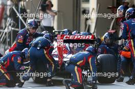 Daniil Kvyat (RUS) Scuderia Toro Rosso STR9 pit stop. 12.10.2014. Formula 1 World Championship, Rd 16, Russian Grand Prix, Sochi Autodrom, Sochi, Russia, Race Day.