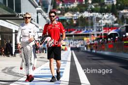 Max Chilton (GBR) Marussia F1 Team with Sam Village (GBR) Marussia F1 Team. 11.10.2014. Formula 1 World Championship, Rd 16, Russian Grand Prix, Sochi Autodrom, Sochi, Russia, Qualifying Day.