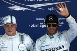 Valtteri Bottas (FIN), Williams F1 Team and Lewis Hamilton (GBR), Mercedes AMG F1 Team  11.10.2014. Formula 1 World Championship, Rd 16, Russian Grand Prix, Sochi Autodrom, Sochi, Russia, Qualifying Day.