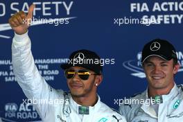 Lewis Hamilton (GBR), Mercedes AMG F1 Team and Nico Rosberg (GER), Mercedes AMG F1 Team  11.10.2014. Formula 1 World Championship, Rd 16, Russian Grand Prix, Sochi Autodrom, Sochi, Russia, Qualifying Day.