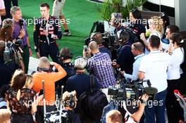 Daniil Kvyat (RUS) Scuderia Toro Rosso with David Coulthard (GBR) Red Bull Racing and Scuderia Toro Advisor / BBC Television Commentator in the paddock. 11.10.2014. Formula 1 World Championship, Rd 16, Russian Grand Prix, Sochi Autodrom, Sochi, Russia, Qualifying Day.