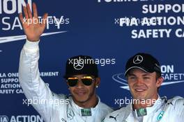 Lewis Hamilton (GBR), Mercedes AMG F1 Team and Nico Rosberg (GER), Mercedes AMG F1 Team  11.10.2014. Formula 1 World Championship, Rd 16, Russian Grand Prix, Sochi Autodrom, Sochi, Russia, Qualifying Day.