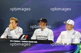 The post qualifying FIA Press Conference (L to R): Nico Rosberg (GER) Mercedes AMG F1, second; Lewis Hamilton (GBR) Mercedes AMG F1, pole position; Valtteri Bottas (FIN) Williams, third. 11.10.2014. Formula 1 World Championship, Rd 16, Russian Grand Prix, Sochi Autodrom, Sochi, Russia, Qualifying Day.