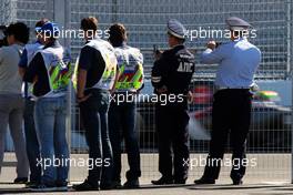 Security watch Esteban Gutierrez (MEX) Sauber C33. 11.10.2014. Formula 1 World Championship, Rd 16, Russian Grand Prix, Sochi Autodrom, Sochi, Russia, Qualifying Day.