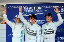 Qualifying top three in parc ferme (L to R): Valtteri Bottas (FIN) Williams, third; Lewis Hamilton (GBR) Mercedes AMG F1, pole position; Nico Rosberg (GER) Mercedes AMG F1, second. 11.10.2014. Formula 1 World Championship, Rd 16, Russian Grand Prix, Sochi Autodrom, Sochi, Russia, Qualifying Day.