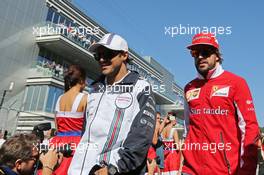 (L to R): Felipe Massa (BRA) Williams with Fernando Alonso (ESP) Ferrari on the drivers parade. 12.10.2014. Formula 1 World Championship, Rd 16, Russian Grand Prix, Sochi Autodrom, Sochi, Russia, Race Day.