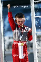 A young fan. 09.10.2014. Formula 1 World Championship, Rd 16, Russian Grand Prix, Sochi Autodrom, Sochi, Russia, Preparation Day.