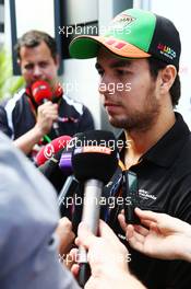 Sergio Perez (MEX) Sahara Force India F1 with the media. 09.10.2014. Formula 1 World Championship, Rd 16, Russian Grand Prix, Sochi Autodrom, Sochi, Russia, Preparation Day.