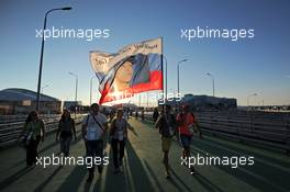 Fans with a Daniil Kvyat (RUS) Scuderia Toro Rosso flag. 09.10.2014. Formula 1 World Championship, Rd 16, Russian Grand Prix, Sochi Autodrom, Sochi, Russia, Preparation Day.