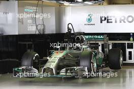 The Mercedes AMG F1 W05 of Lewis Hamilton (GBR) Mercedes AMG F1 int eh pit garage. 09.10.2014. Formula 1 World Championship, Rd 16, Russian Grand Prix, Sochi Autodrom, Sochi, Russia, Preparation Day.