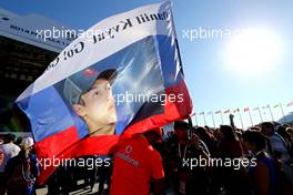 Track atmosphere, public area, autographs session. Fan of Daniil Kvyat (RUS), Scuderia Toro Rosso  09.10.2014. Formula 1 World Championship, Rd 16, Russian Grand Prix, Sochi Autodrom, Sochi, Russia, Preparation Day.