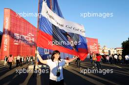 A fan with a flag for Daniil Kvyat (RUS) Scuderia Toro Rosso. 09.10.2014. Formula 1 World Championship, Rd 16, Russian Grand Prix, Sochi Autodrom, Sochi, Russia, Preparation Day.