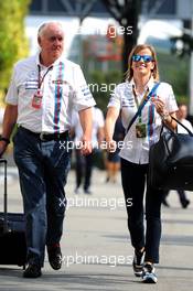 (L to R): Edward Charlton (GBR) Williams Non-Executive Director with Susie Wolff (GBR) Williams Development Driver. 19.09.2014. Formula 1 World Championship, Rd 14, Singapore Grand Prix, Singapore, Singapore, Practice Day.