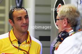 (L to R): Cyril Abiteboul (FRA) Renault Sport F1 Managing Director with Dr Helmut Marko (AUT) Red Bull Motorsport Consultant. 19.09.2014. Formula 1 World Championship, Rd 14, Singapore Grand Prix, Singapore, Singapore, Practice Day.