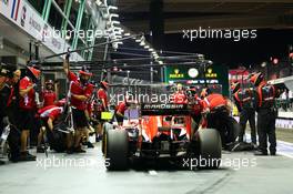 Jules Bianchi (FRA) Marussia F1 Team MR03 practices a pit stop. 19.09.2014. Formula 1 World Championship, Rd 14, Singapore Grand Prix, Singapore, Singapore, Practice Day.