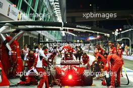 Kimi Raikkonen (FIN) Ferrari F14-T practies a pit stop. 19.09.2014. Formula 1 World Championship, Rd 14, Singapore Grand Prix, Singapore, Singapore, Practice Day.