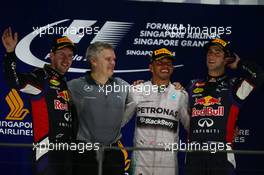1st place Lewis Hamilton (GBR) Mercedes AMG F1, 2nd place Sebastian Vettel (GER) Red Bull Racing RB10 and 3rd place Daniel Ricciardo (AUS) Red Bull Racing RB10. 21.09.2014. Formula 1 World Championship, Rd 14, Singapore Grand Prix, Singapore, Singapore, Race Day.