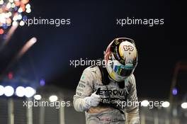 Race winner Lewis Hamilton (GBR) Mercedes AMG F1 celebrates in parc ferme. 21.09.2014. Formula 1 World Championship, Rd 14, Singapore Grand Prix, Singapore, Singapore, Race Day.