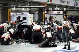 Adrian Sutil (GER) Sauber C33 makes a pit stop. 21.09.2014. Formula 1 World Championship, Rd 14, Singapore Grand Prix, Singapore, Singapore, Race Day.