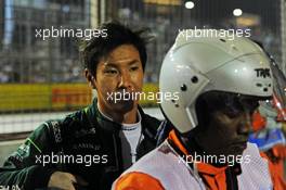 Kamui Kobayashi (JPN) Caterham retired from the race on the formation lap. 21.09.2014. Formula 1 World Championship, Rd 14, Singapore Grand Prix, Singapore, Singapore, Race Day.