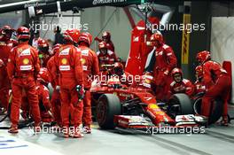 Kimi Raikkonen (FIN) Ferrari F14-T makes a pit stop. 21.09.2014. Formula 1 World Championship, Rd 14, Singapore Grand Prix, Singapore, Singapore, Race Day.