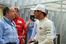 (L to R): Jean Todt (FRA) FIA President with Felipe Massa (BRA) Williams. 20.09.2014. Formula 1 World Championship, Rd 14, Singapore Grand Prix, Singapore, Singapore, Qualifying Day.
