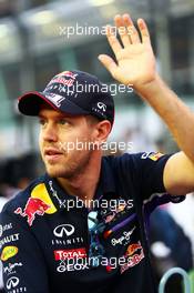 Sebastian Vettel (GER) Red Bull Racing on the drivers parade. 21.09.2014. Formula 1 World Championship, Rd 14, Singapore Grand Prix, Singapore, Singapore, Race Day.